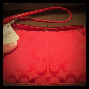Cherry red Coach wristlet